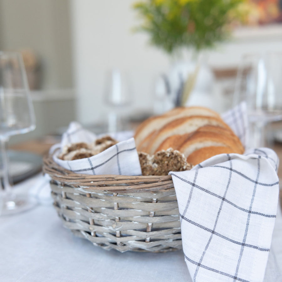 bread basket with napkin and bread