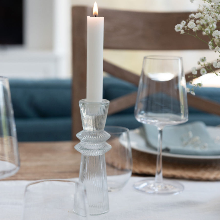 clear candlestick on dining table