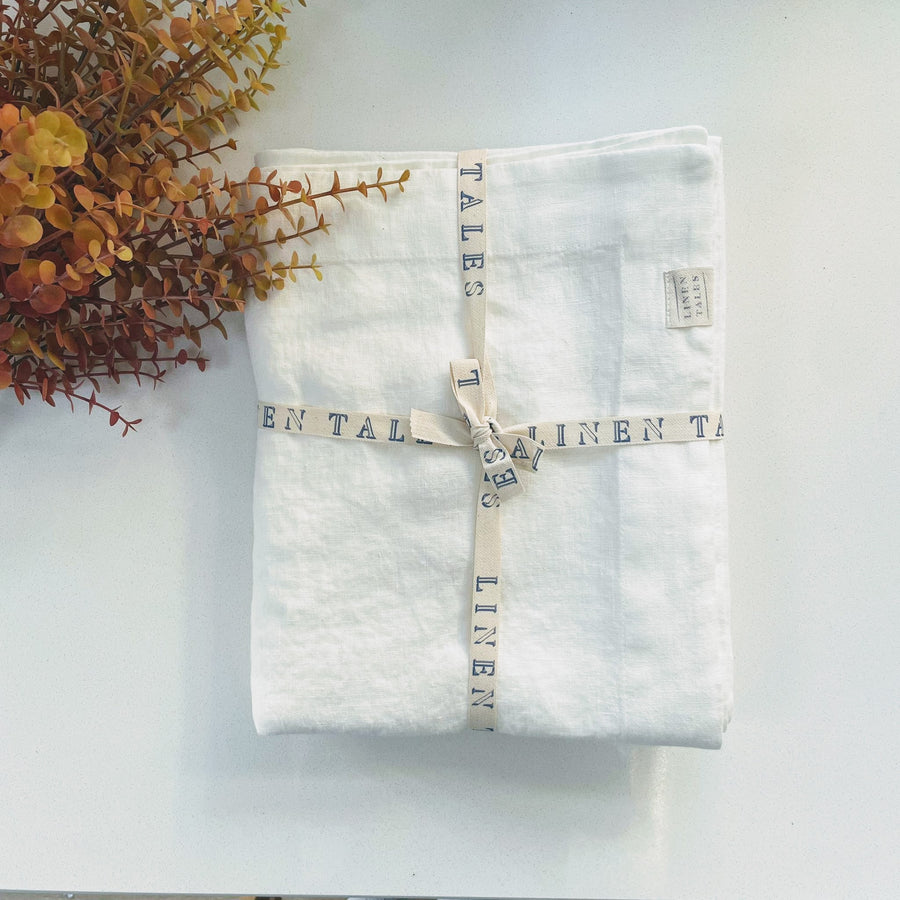 white linen tablecloth