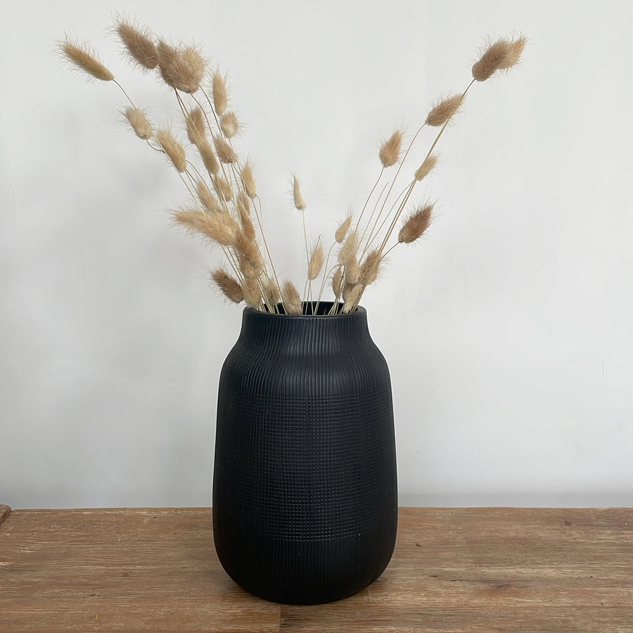Black groove vase with dried flowers