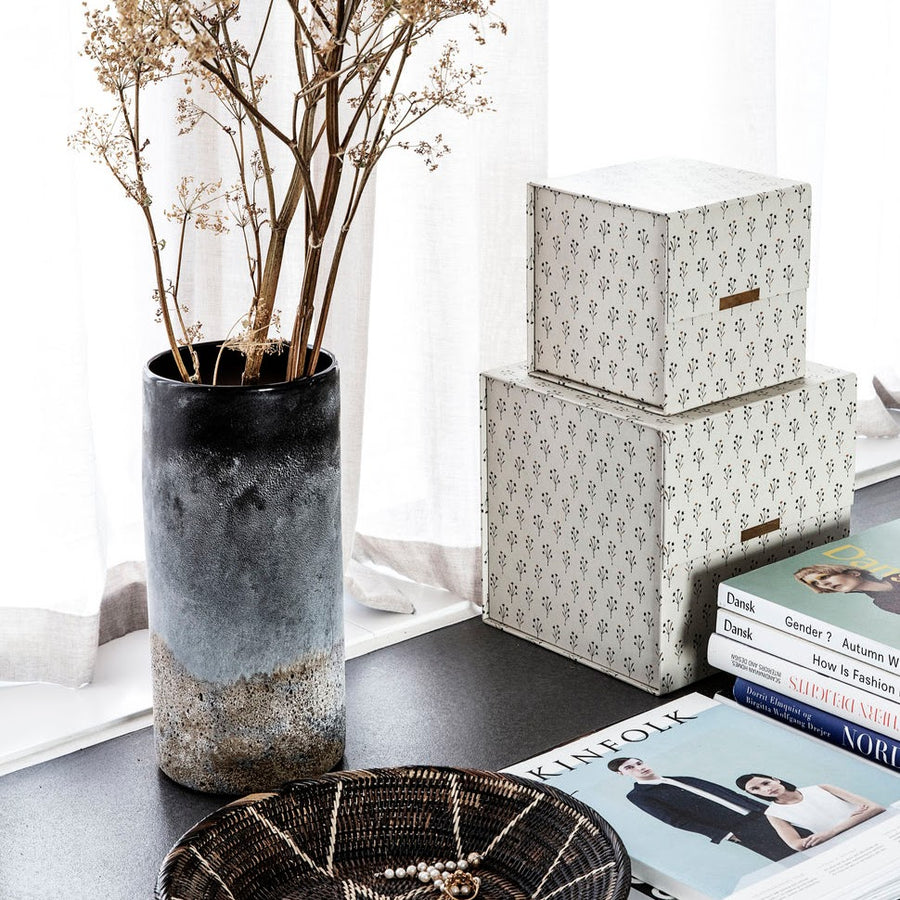 Cylinder style rock vase on desk