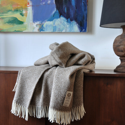 brown and cream throw