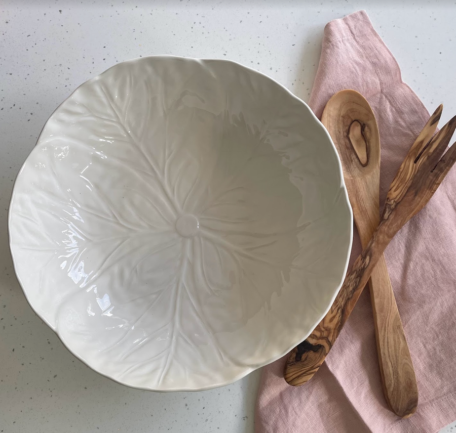 large salad bowl with wooden servers